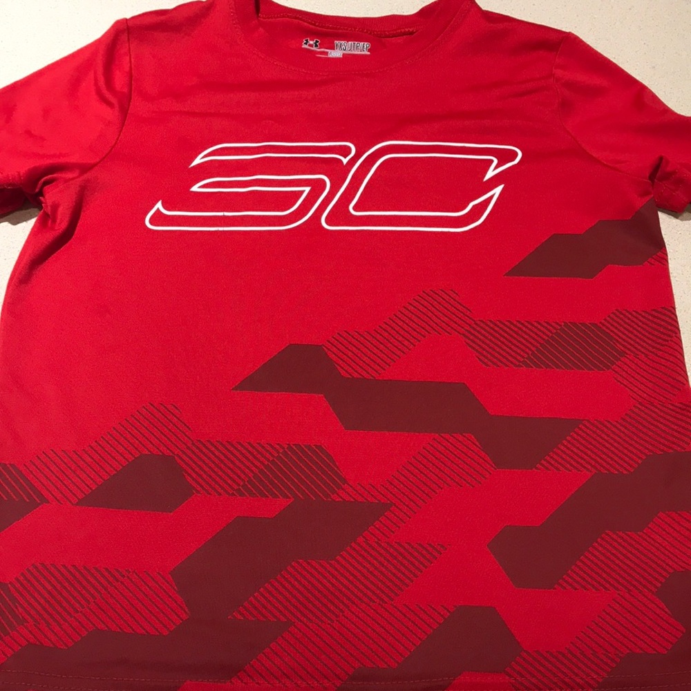 Boys red SC Under Armour shirt.